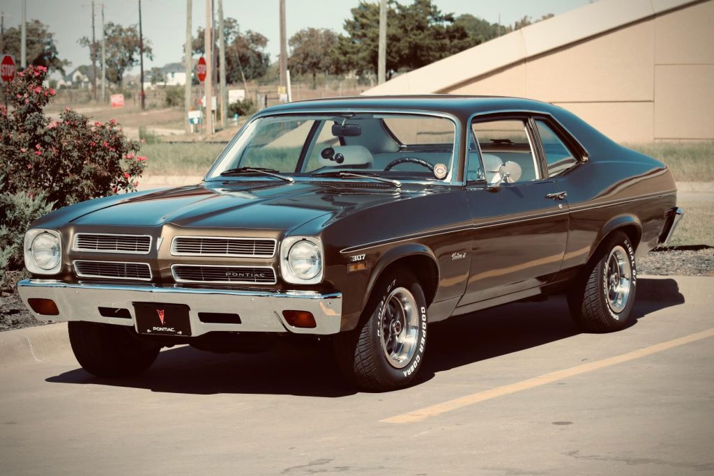 Pontiac Ventura II 307 in parking lot