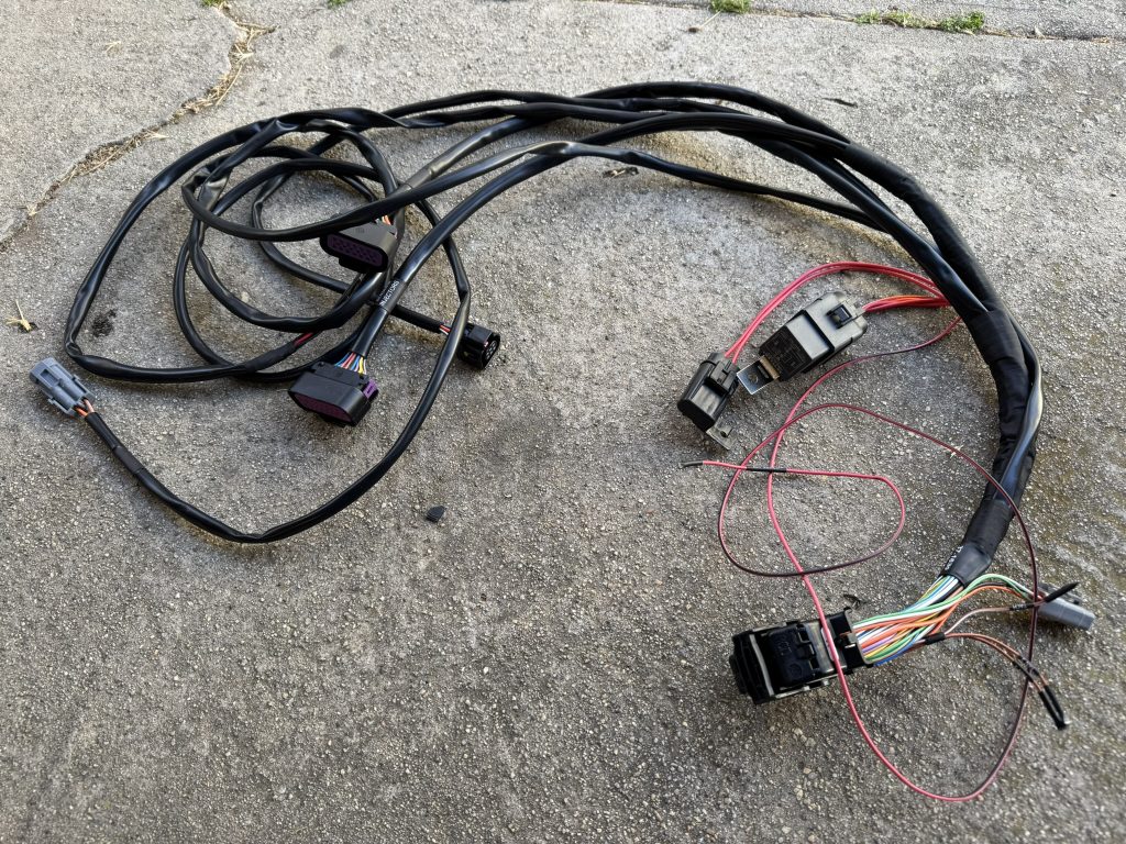 wiring harness resting on concrete floor