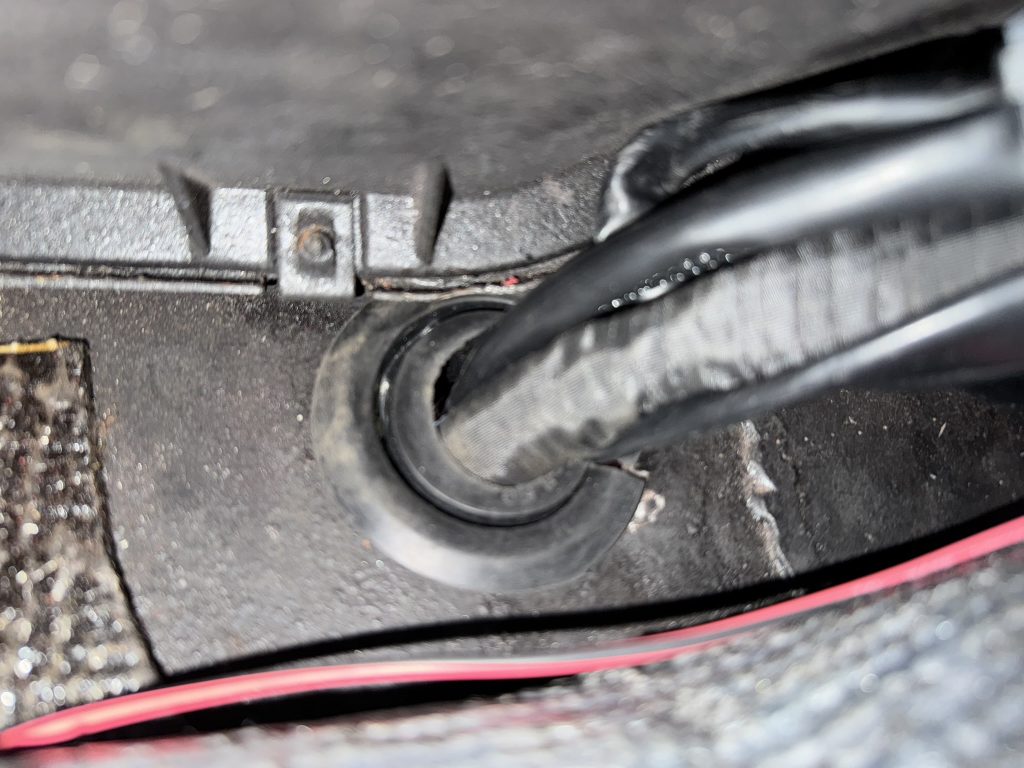 wires passing through firewall grommet