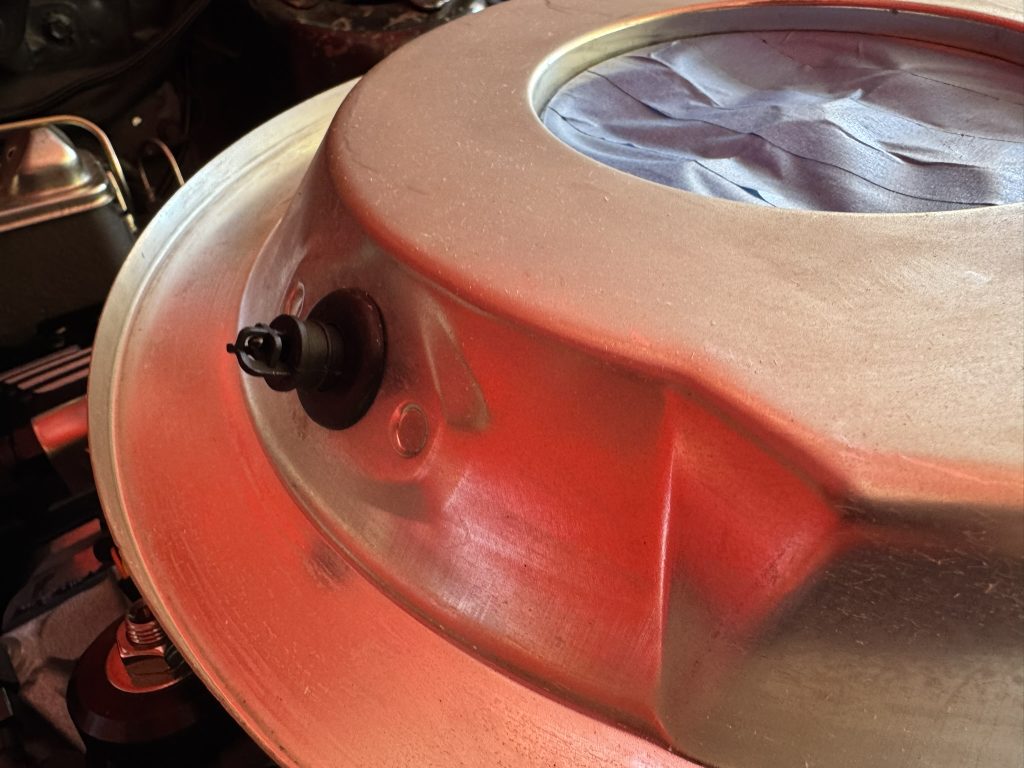 fitting on the inside of an air cleaner