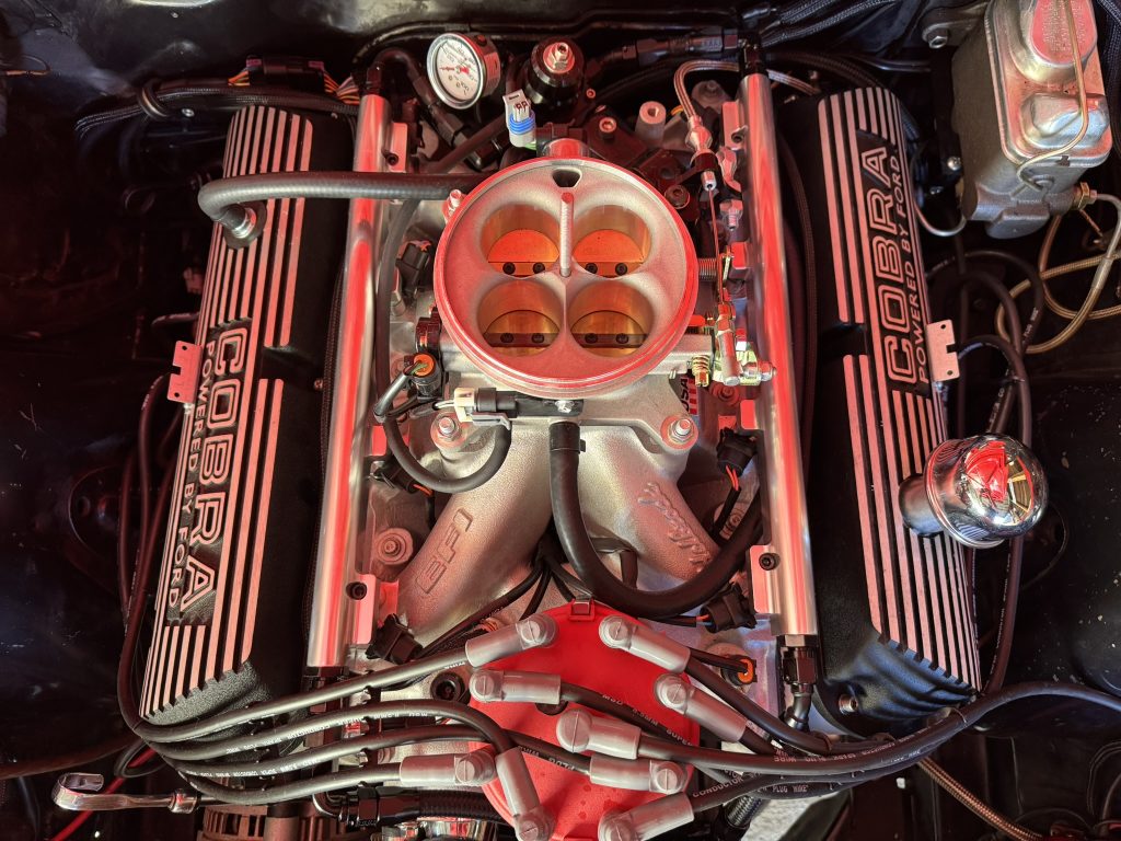 top view of an edelbrock pro flo efi system on a Ford v8