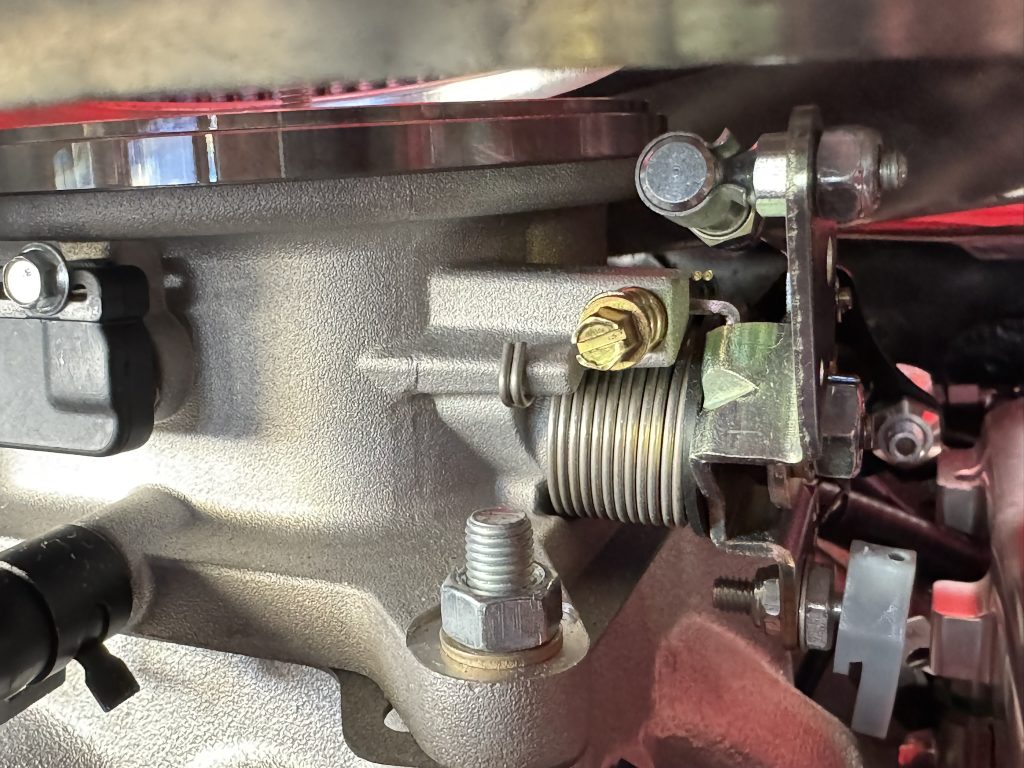 adjustment screw location on an efi throttle body