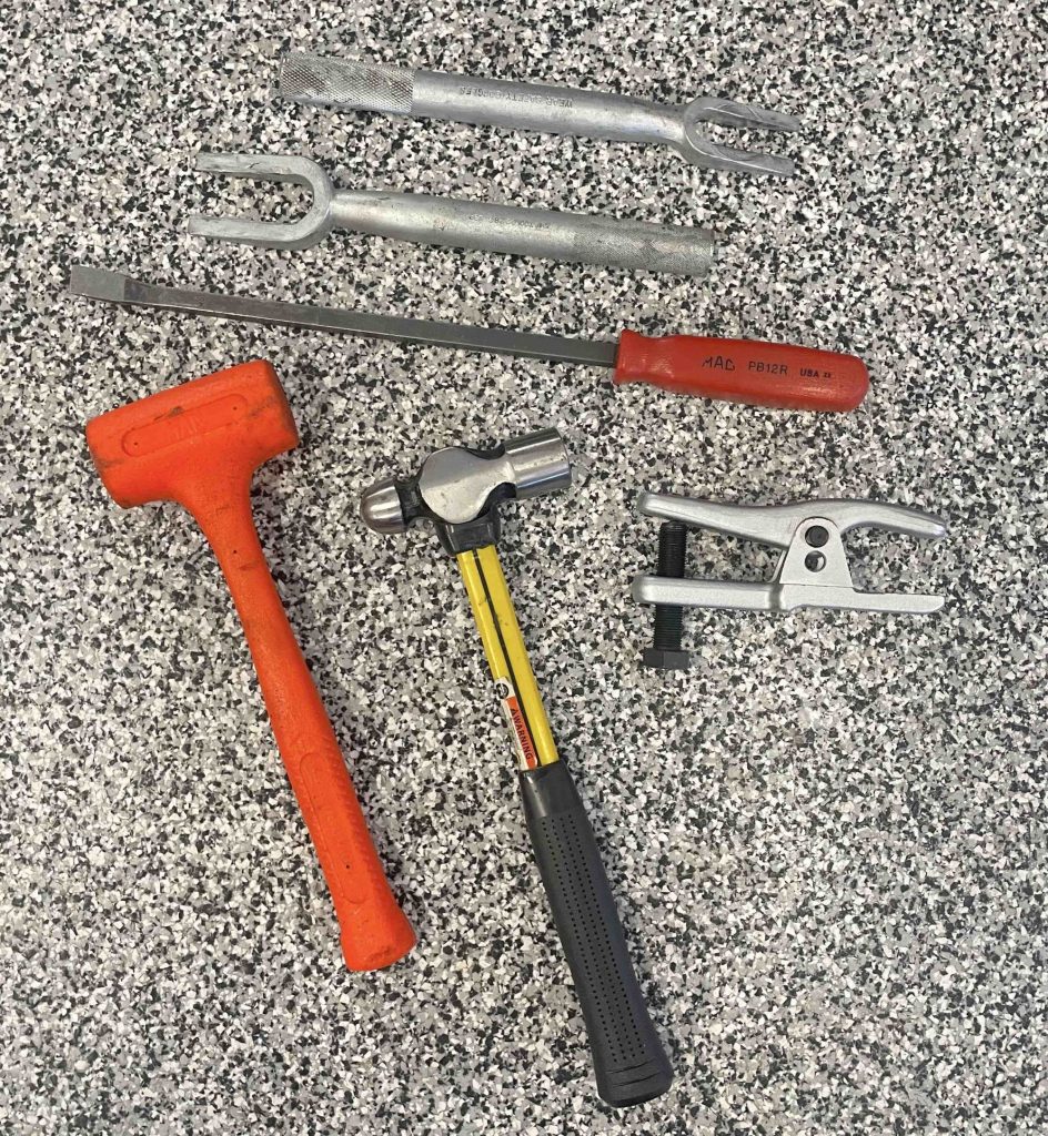Pickle forks, pry bars, and hammers for front suspension work