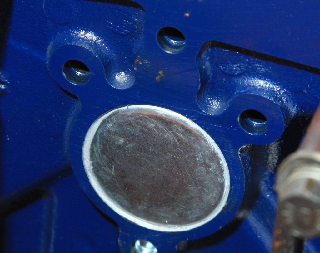 Rear camshaft plug on a Ford FE engine